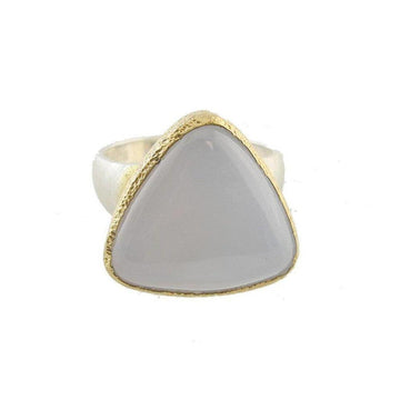 Silver and gold Chalcedony ring featuring a triangular grey gemstone.
