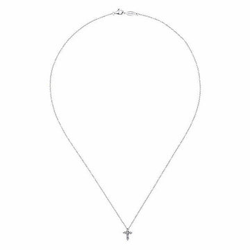 Dainty diamond cross pendant on a delicate chain necklace.
