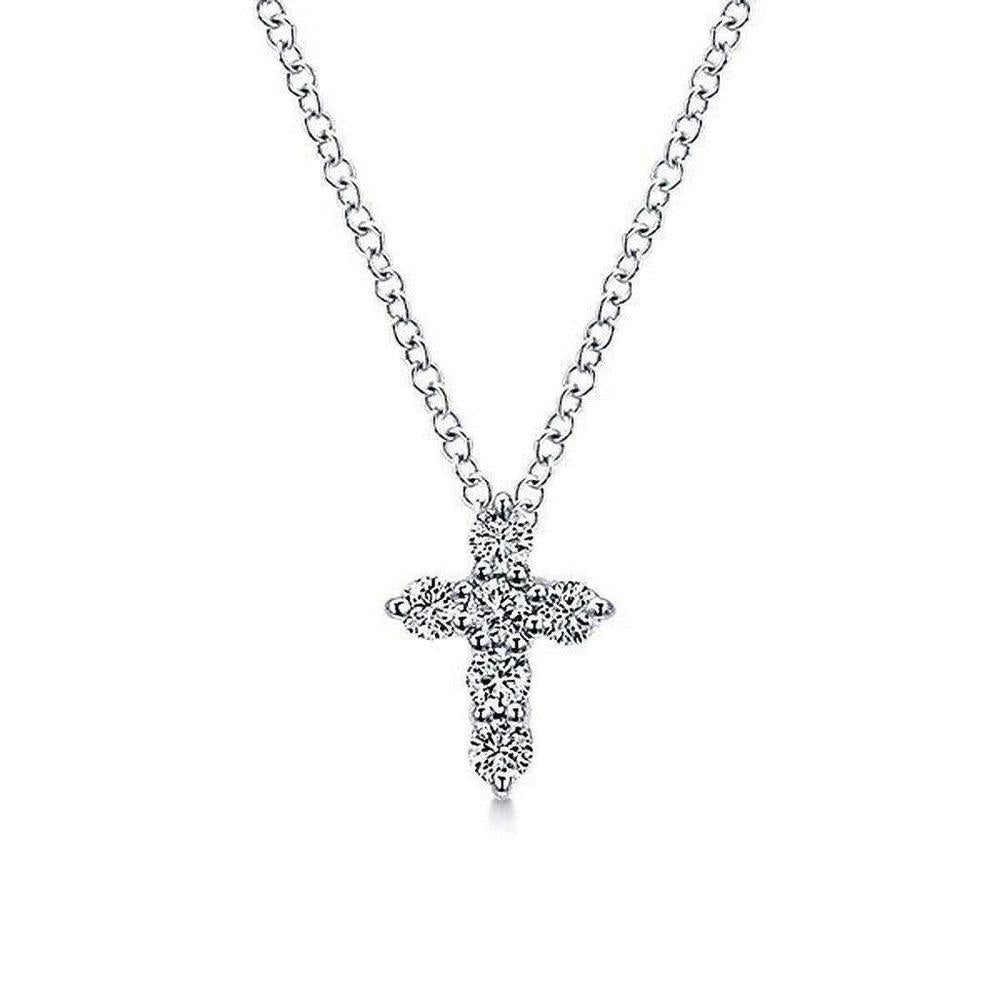 Diamond Cross Necklace: Elegant silver chain, delicate cross pendant adorned with sparkling diamonds.
