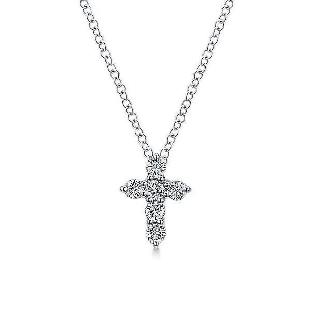 Diamond Cross Necklace: Elegant silver chain, delicate cross pendant adorned with sparkling diamonds.
