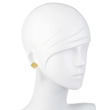 Gold stud earrings with textured rose design, shown on a mannequin.
