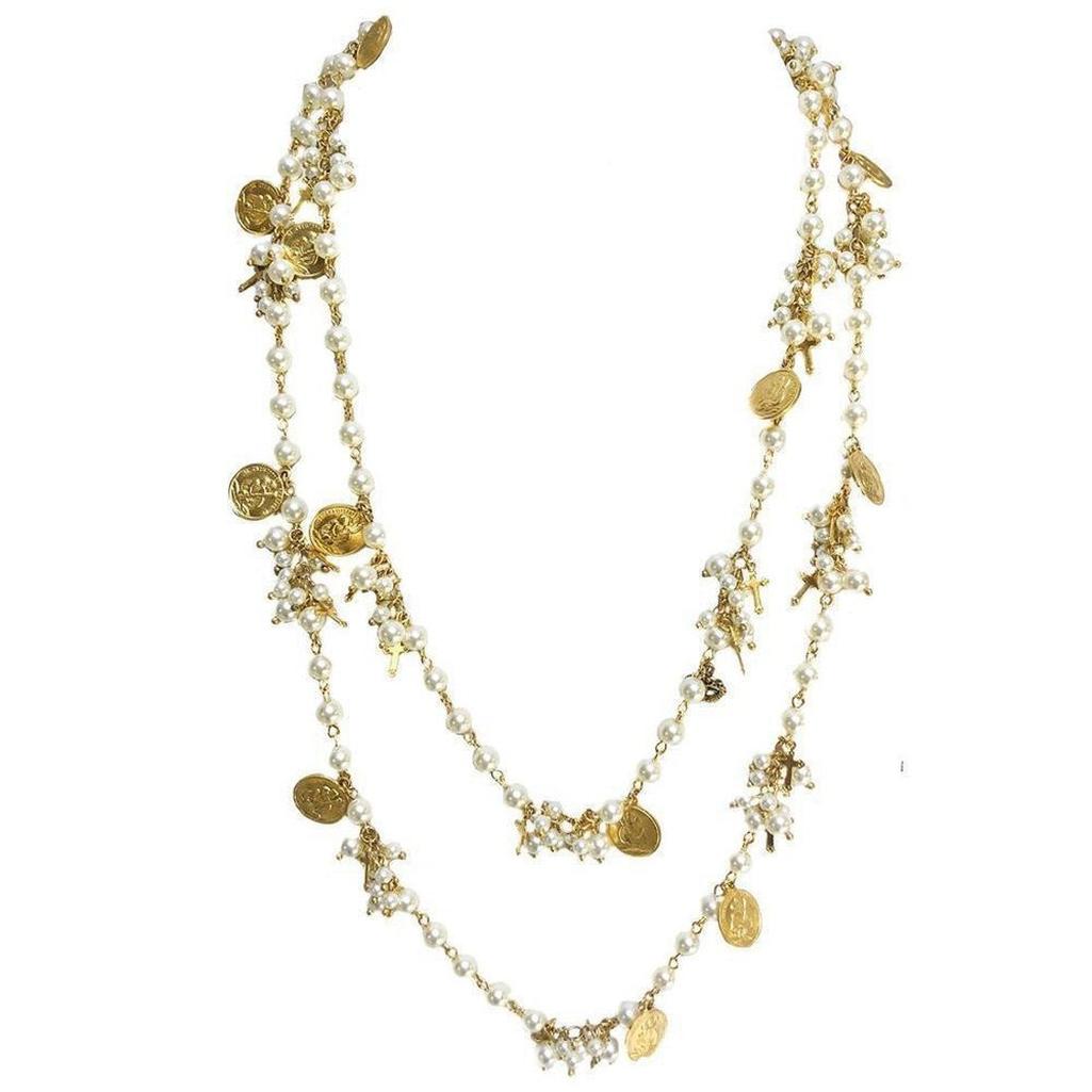 Empress Wrap: Double-strand pearl necklace with gold coin and cross accents.
