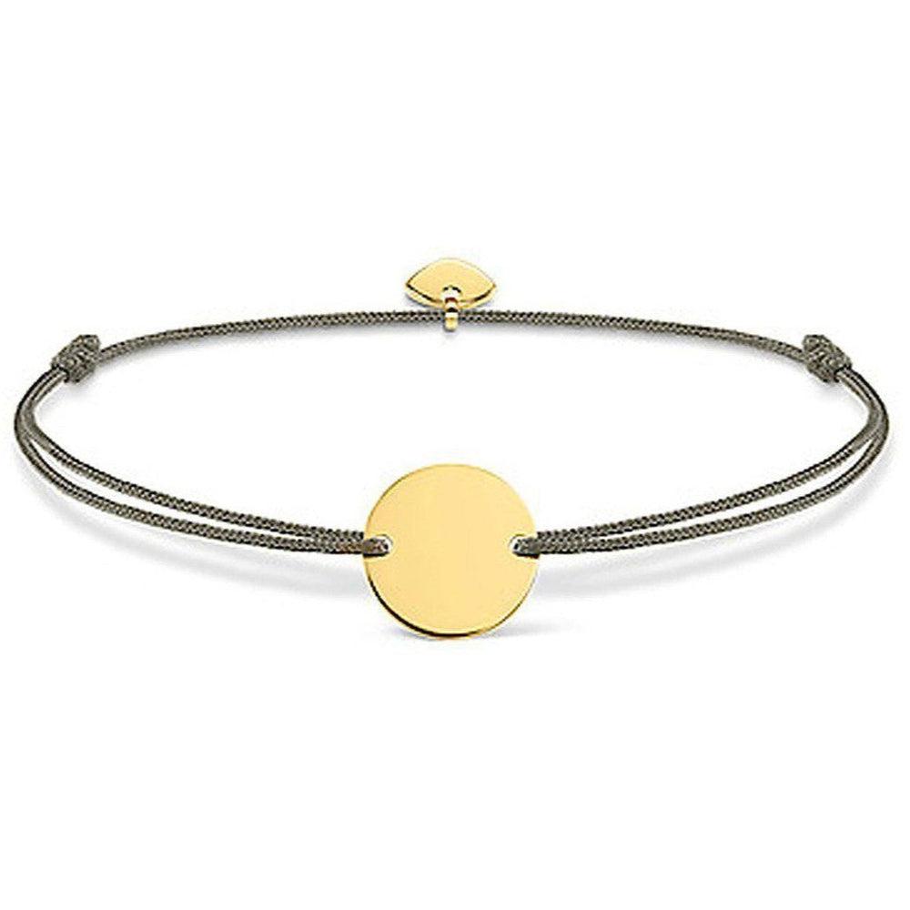 Engravable gold disc bracelet on beige cord
