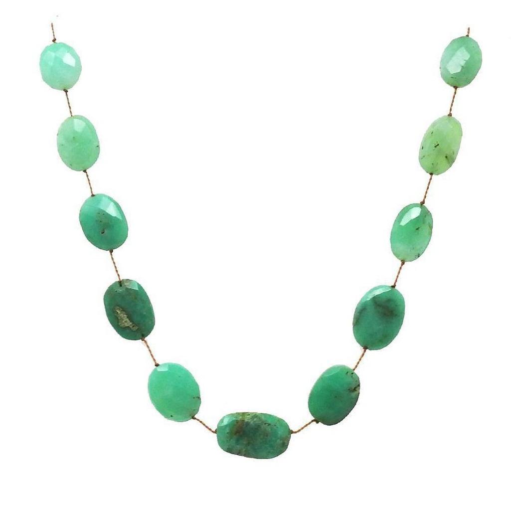 Green chrysoprase gemstone necklace with oval beads on a delicate cord.

