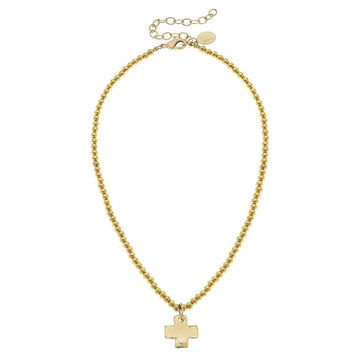 Gold beaded chain necklace with small cross pendant.

