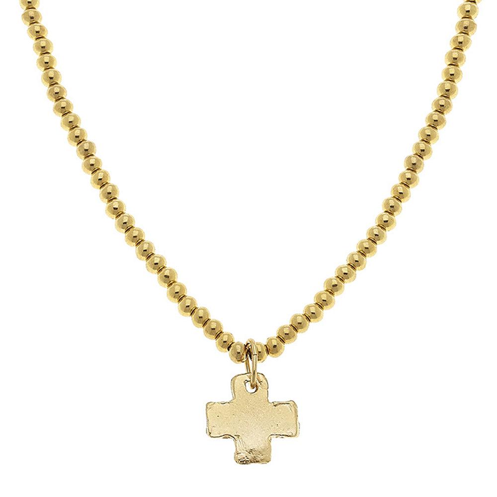 Gold beaded chain necklace with textured gold cross pendant
