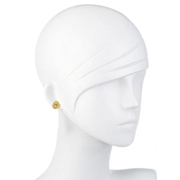 Gold rope knot stud earrings on a mannequin.
