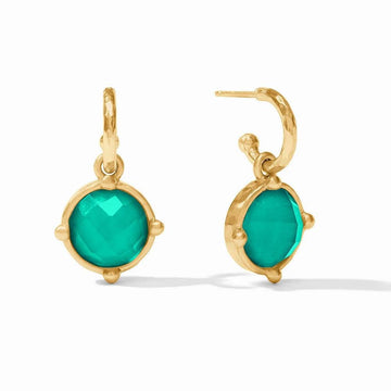 Gold hoop earrings with teal gemstone accents.

