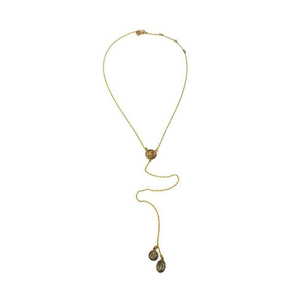 Gold lariat necklace with circular medallions; features a longer chain and smaller accents.
