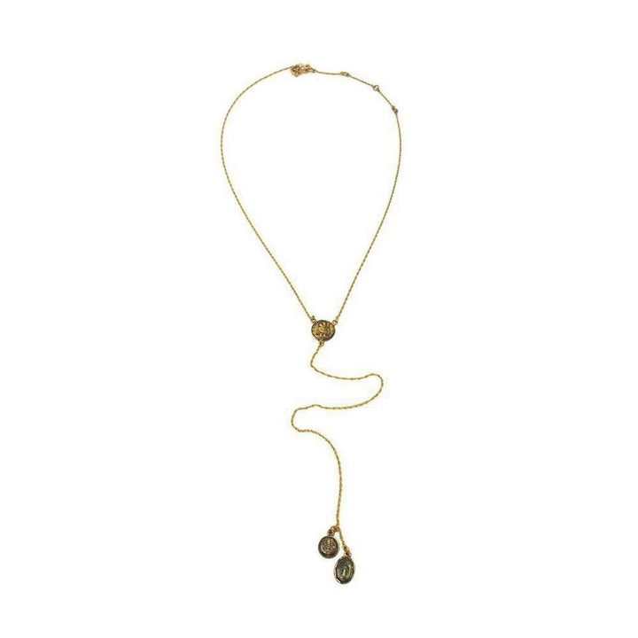 Gold lariat necklace with circular medallions; features a longer chain and smaller accents.

