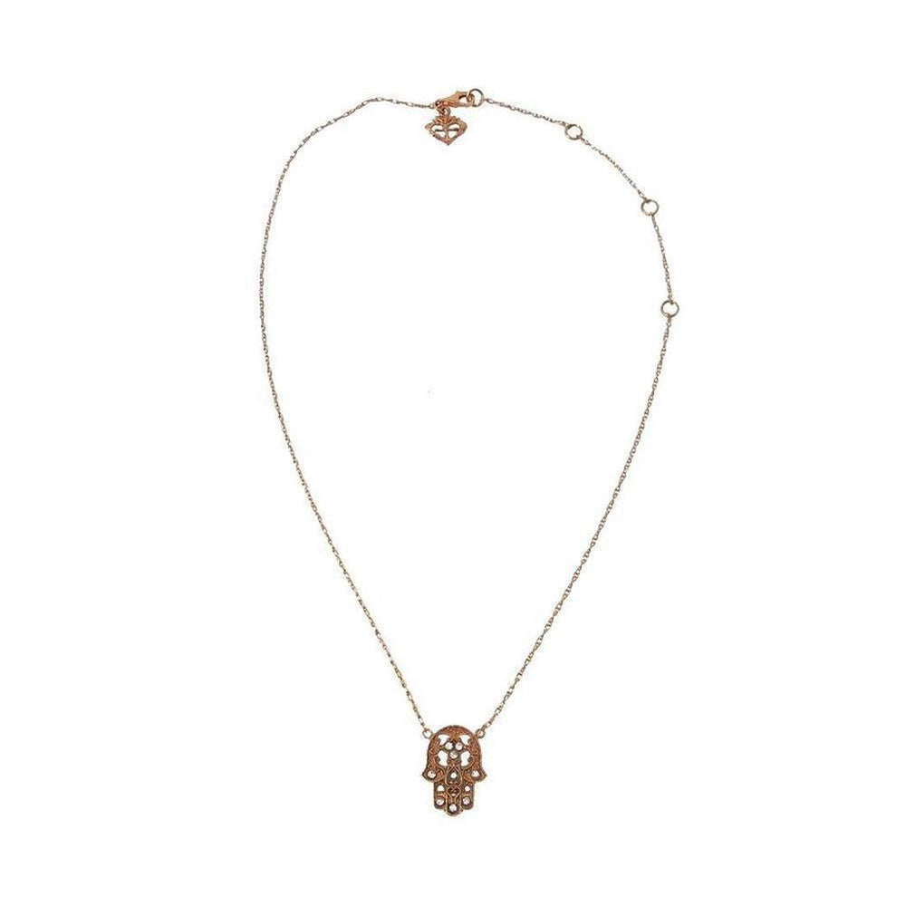 Rose gold hamsa necklace with delicate chain.
