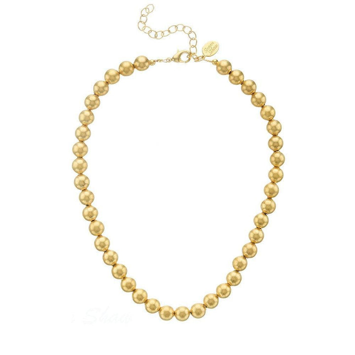 Mini Margaret gold bead necklace; elegant, gold-tone, matte finish.

