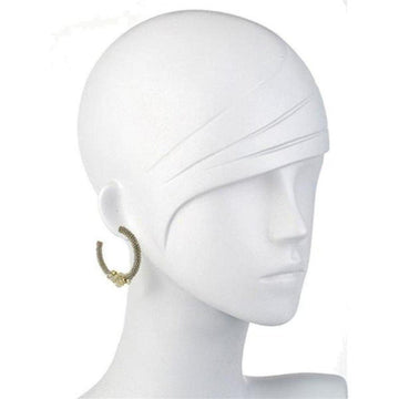 Beaded silver hoop earrings on a mannequin, showcasing detailed texture.
