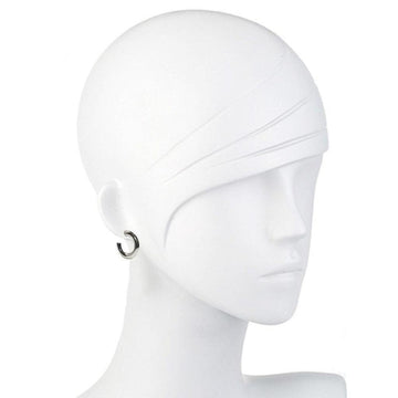 Silver hoop earring on a mannequin.
