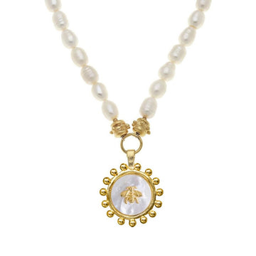 Mother of Pearl Bee Necklace: Freshwater pearl strand with gold bee charm pendant.

