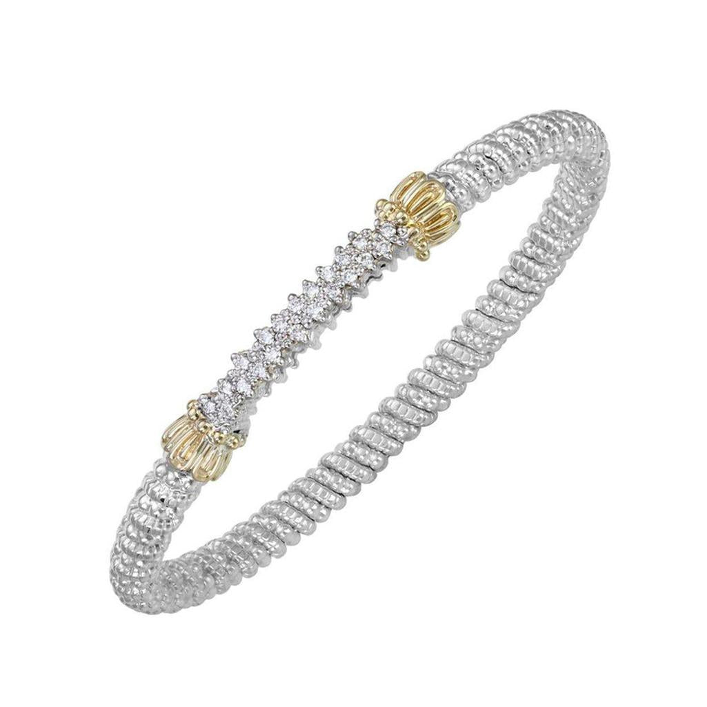 Pave Bar Bangle Bracelet with sparkling diamonds, gold accents, and a twisted silver band.
